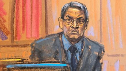 Former Honduras President Juan Orlando Hernandez testifies before U.S. District Judge Kevin Castel during his trial on U.S. drug trafficking charges in federal court in the Manhattan borough of New York City, U.S., March 5, 2024 in this courtroom sketch.