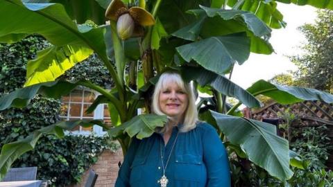 Julia Brown and the banana plant