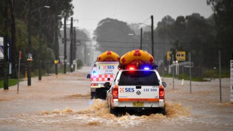 Emergency vehicles in flooded Sydney