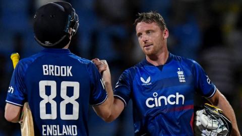 Jos Buttler and Harry Brook celebrate victory