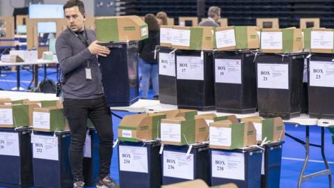 Ballot boxes arrive at the Glasgow City Council count at the Emirates Arena, in Glasgow
