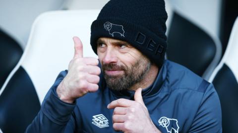 Derby boss Paul Warne give a thumbs up