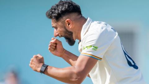 Anuj Dal takes a wicket for Derbyshire