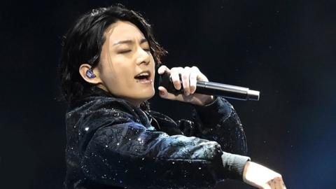 Jung Kook of BTS performs during the opening ceremony prior to the FIFA World Cup Qatar 2022 Group A match between Qatar and Ecuador at Al Bayt Stadium on November 20, 202