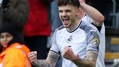 Jamie Paterson celebrates scoring a goal