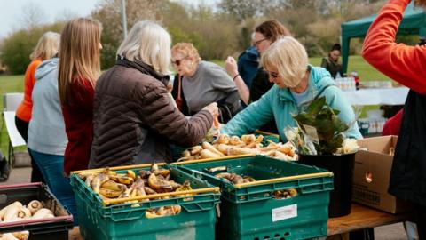 People handing out food