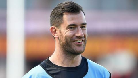 Mark Atkinson on the field during a pre-match warm-up for Gloucester this season