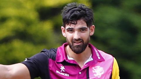 Andy Umeed holds his bat aloft during Somerset's One-Day Cup campaign