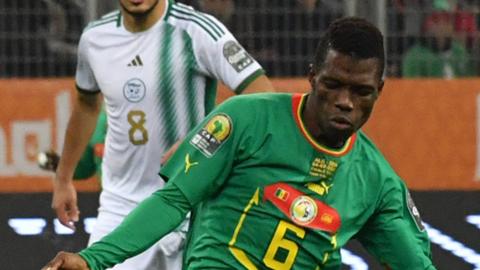 Ousmane Kane in action for Senegal