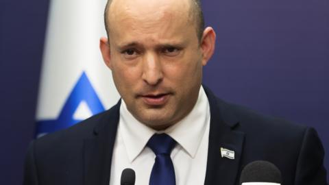 Naftali Bennett speaks during a meeting of his Yamina party in the Israeli parliament on 5 July 2021