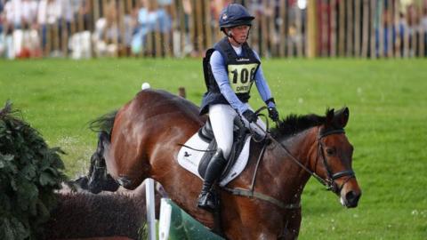 Ros Canter and her horse clear a fence
