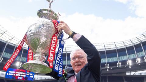 Wigan Warriors co-owner Ian Lenagan with the Challenge Cup trophy in 2022