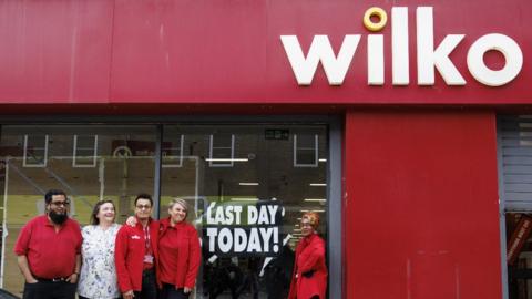 Wilko staff pose for a photo