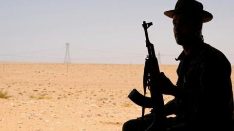 A member of the Libyan National Army (LNA) commanded by Khalifa Haftar sits in a tent at one of their sites in west of Sirte, Libya August 19, 2020.