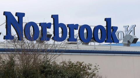 Signage that reads "Norbrook" at the company's Newry headquarters