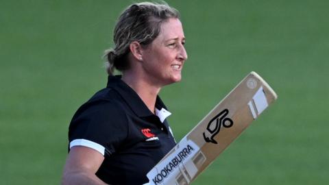 New Zealand's Sophie Devine celebrates her century against England in the third one-day international