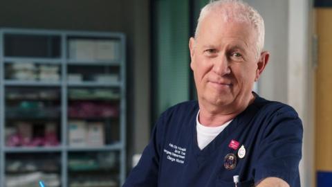 Actor Derek Thompson on the set of Casualty