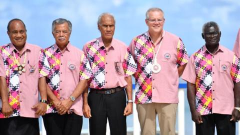 Kiribati's President Taneti Maamau, Cook Islands Prime Minister Henry Puna, Tonga's Prime Minister Akilisi Pohiva, Australia's Prime Minister Scott Morrison and Solomon Islands Prime Minister Manasseh Sogavare pose for a group photo at the Pacific Islands Forum in 2019