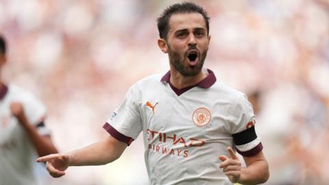 Bernardo Silva celebrates scoring for Manchester City against West Ham