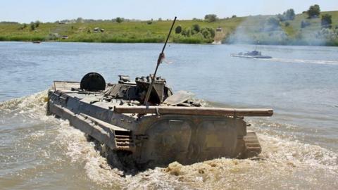 Ukrainian BMP-1 vehicle crossing water during a training exercise