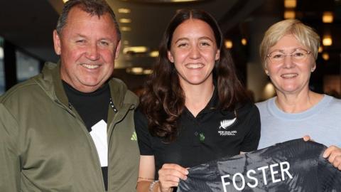 Michaela Foster (centre) poses with her parents, All Blacks coach Ian Foster (left) and Leigh Foster during the New Zealand Women's World Cup squad announcement at Eden Park