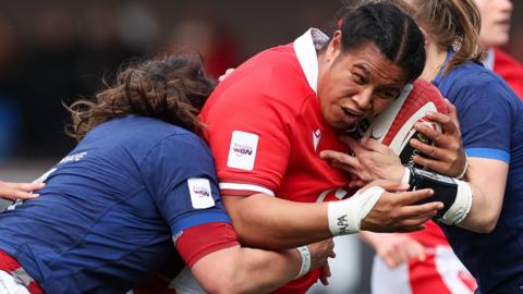 Sisilia Tuipulotu of Wales takes on Annaelle Deshaye of France and Emeline Gros of France