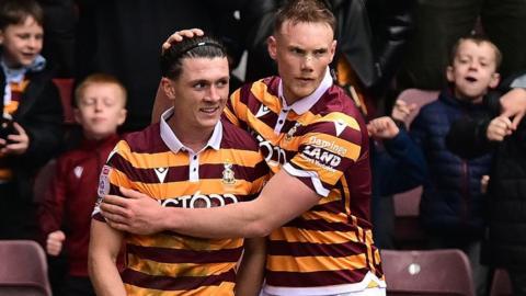 Bradford City players Calum Kavanagh and Ciaran Kelly celebrate