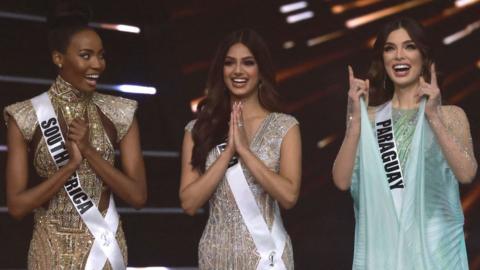 The final three Miss Universe contestants pose on stage during the 70th Miss Universe beauty pageant in Israel's southern Red Sea coastal city of Eilat.