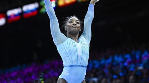 Simone Biles celebrates at the World Gymnastics Championships in Antwerp