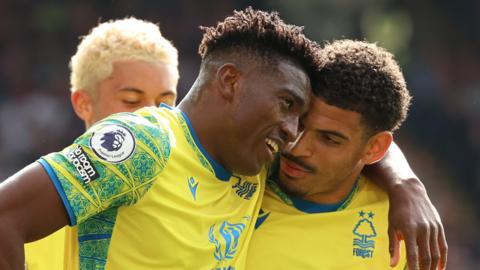 Taiwo Awoniyi of Nottingham Forest celebrates with teammate after scoring the team's first goal during the Premier League match between Crystal Palace and Nottingham Forest at Selhurst Park on May 28, 2023 in London, England