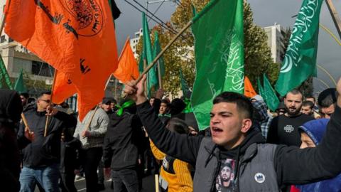 Palestinians take part in a protest against the killing of senior Hamas official, Saleh al-Arouri, in Hebron in the Israeli-occupied West Bank January 3, 2024