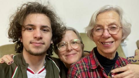 Hisham Awartani pictured here with his mother and grandmother