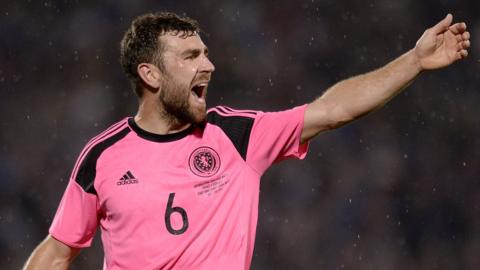 James McArthur playing for Scotland