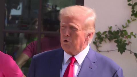 Donald trump speaks to the media in Florida