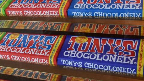 Tony's Chocolonely chocolate on a shop shelf