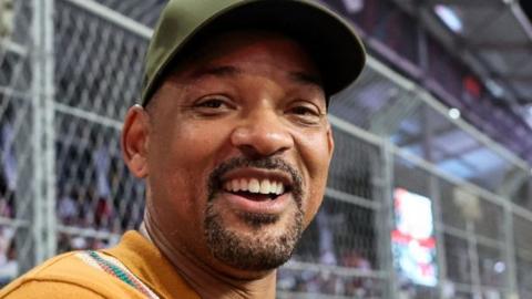 US actor Will Smith visits the pit lane ahead of the Saudi Arabia Formula One Grand Prix at the Jeddah Corniche Circuit in Jeddah on March 19, 2023