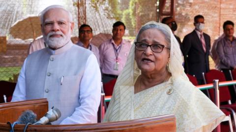 Sheikh Hasina, Bangladesh's prime minister, right, along with Narendra Modi, India's prime minister, speaks to the media during a ceremonial reception at Rashtrapati Bhawan in New Delhi, India, on Tuesday, Sept. 6, 2022