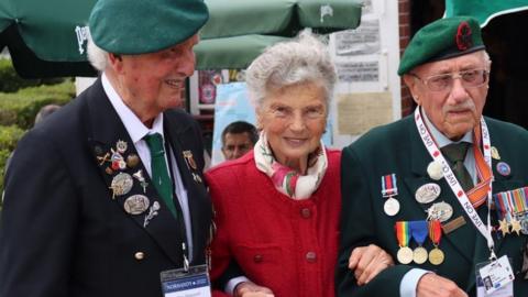 Arlette Gondree with veterans