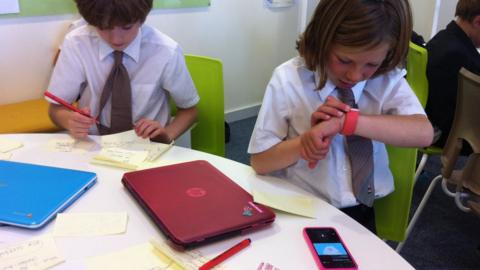 Students learning using smart devices