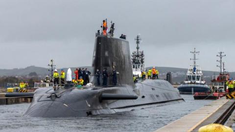 HMS Anson, the fifth Astute class submarine, which BAE Systems has designed and built for the Royal Navy, as it departed the company's shipyard in Barrow-in-Furness, Cumbria, and headed out to open sea for the first time.