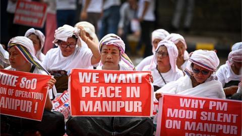 Women from Manipur raise slogans during a protest over the ongoing violence in the state, at Jantar Mantar, on June 19, 2023 in New Delhi, India.