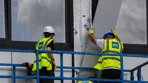 Cladding being removed