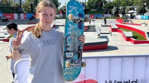 Daisy Buchanan posing for a photo in Dubai while competing at the World Skateboarding Tour