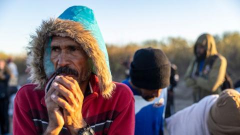 Migrant at Texas-Mexico border on 18 December