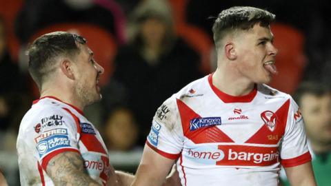 Jack Welsby pokes his tongue out after scoring a try for St Helens against Leigh Leopards