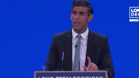 Rishi Sunak speaking at the conference