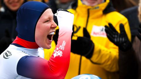Amelia Coltman celebrates one of her runs at the World Championship