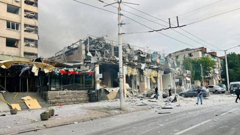 view shows a building of a restaurant heavily damaged by a Russian missile strike,