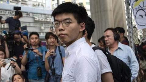 Hong Kong activist Joshua Wong leaves the Lai Chi Kok Correctional Institute