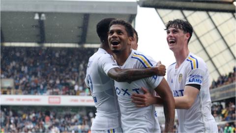 Leeds celebrate their third goal against Millwall